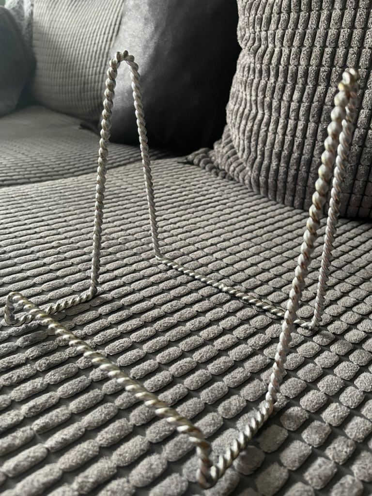 silver-tone, twisted-wire tabletop display easel