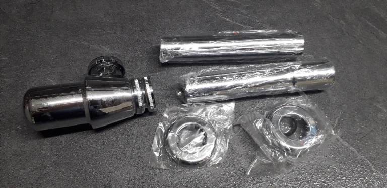 Chrome 1 1/4 inch bottle trap.