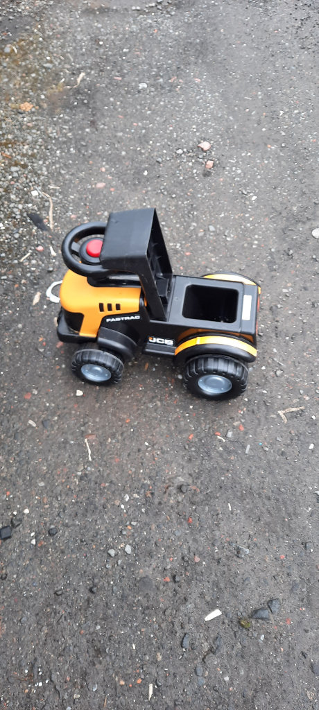 Childs ride on JCB with opening seat... 