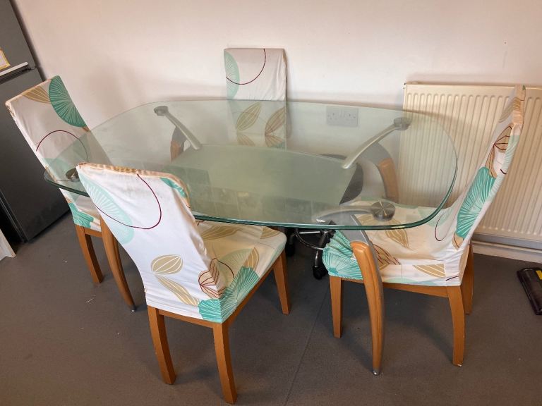 Glass Dining Table with 4 Chairs – Fair Condition