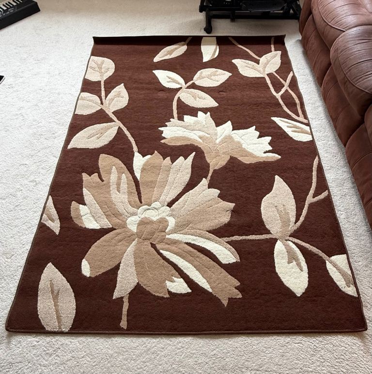 Brown and beige with white flowers rug 