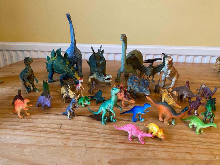 Dinosaurs and exotic wild animal toy figures