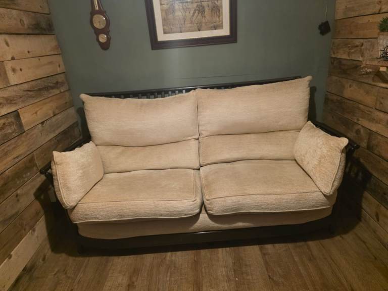 Ercol High Back 3 seater sofa with solid wood frame and feather filled cushions in cream fabric.