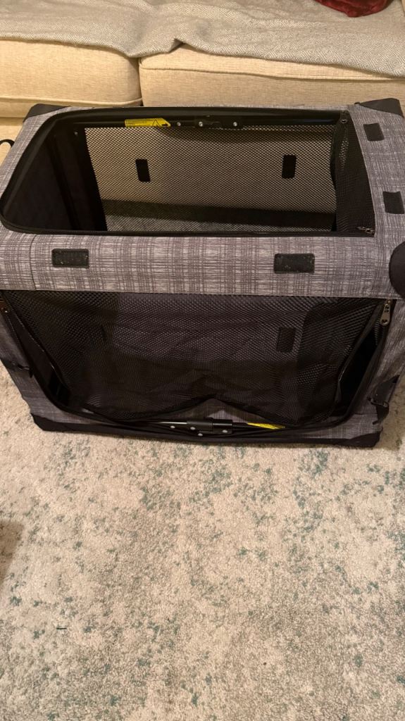 Fold up dog crate and dog coat