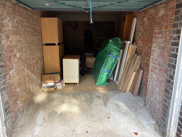 Single garage, dry, secure. No electricity but lighting to private off-road external areas.