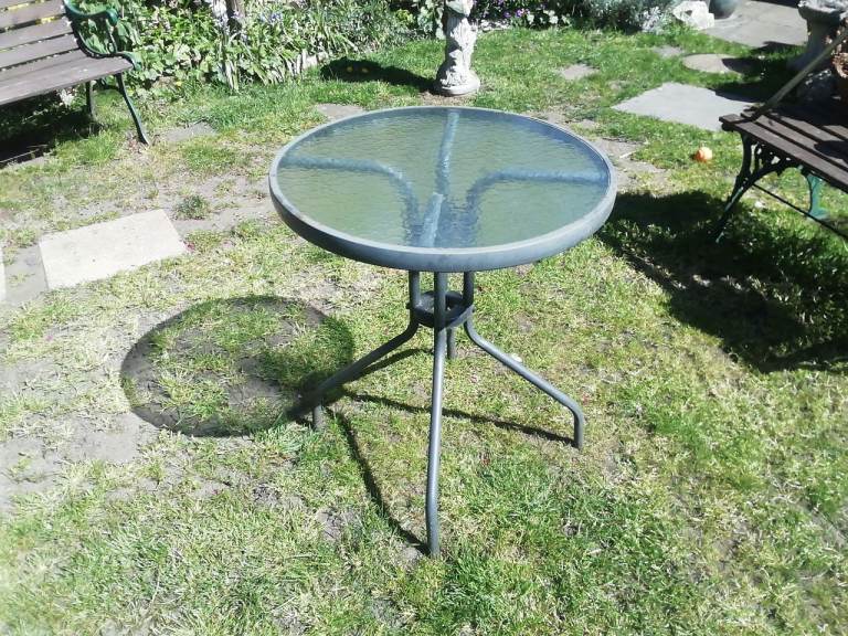 Glass top garden table 