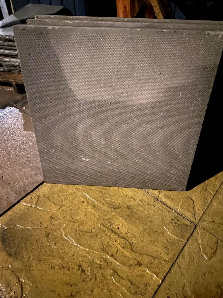 600X600 grey council patio slabs 