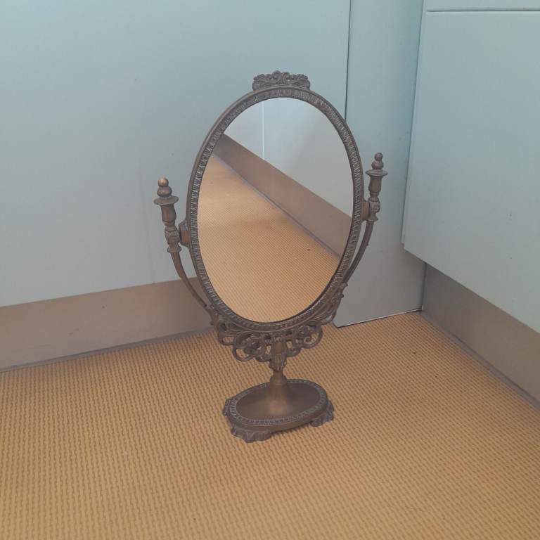 ORNATE OVAL MIRROR
