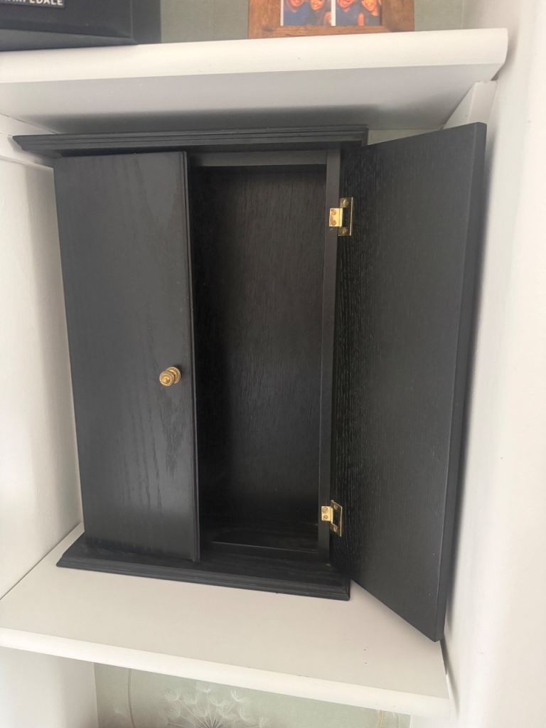 Small Black Wooden Cabinet with Gold Knobs, Good Condition
