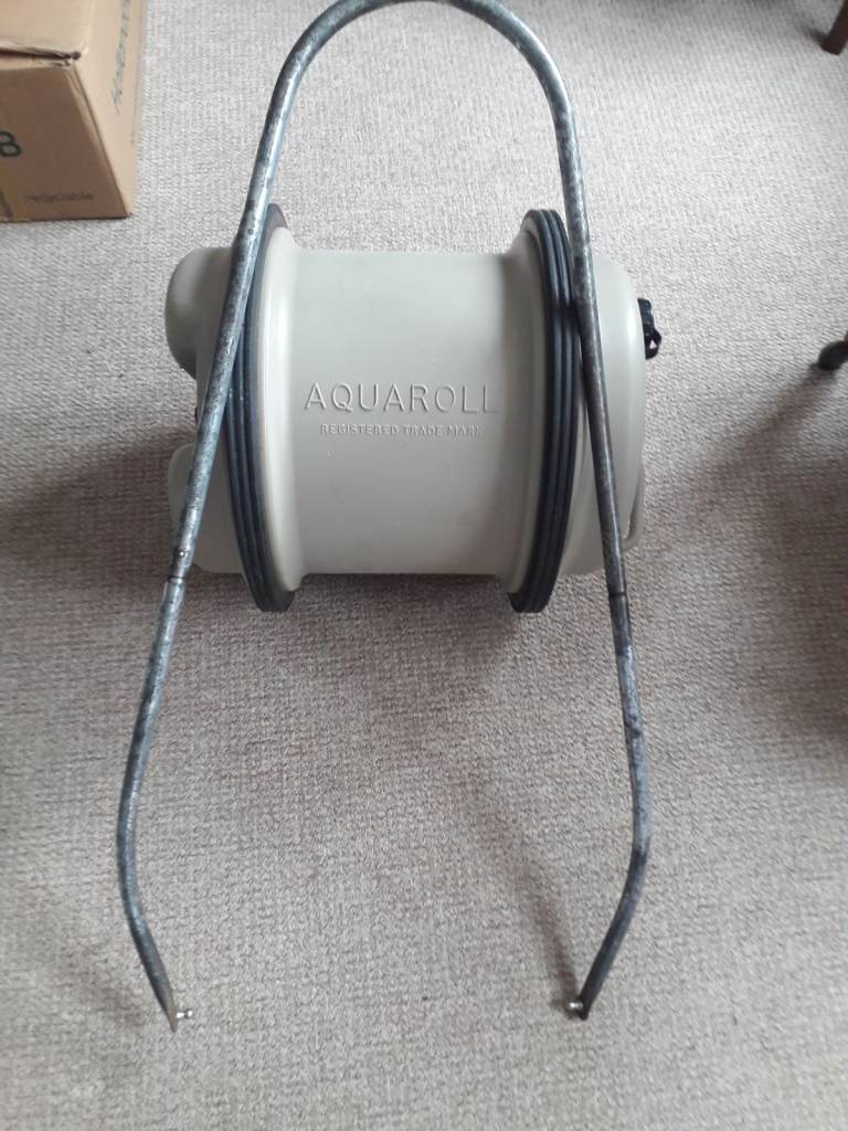 Aquaroll with handle for caravan or campervan