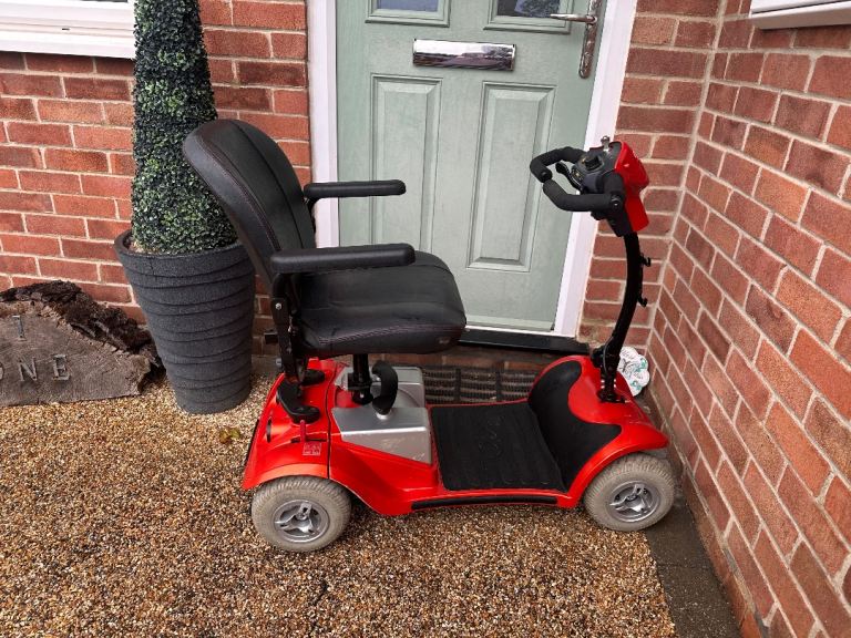 Kymco Mini 4mph transportable mobility scooter, good batteries