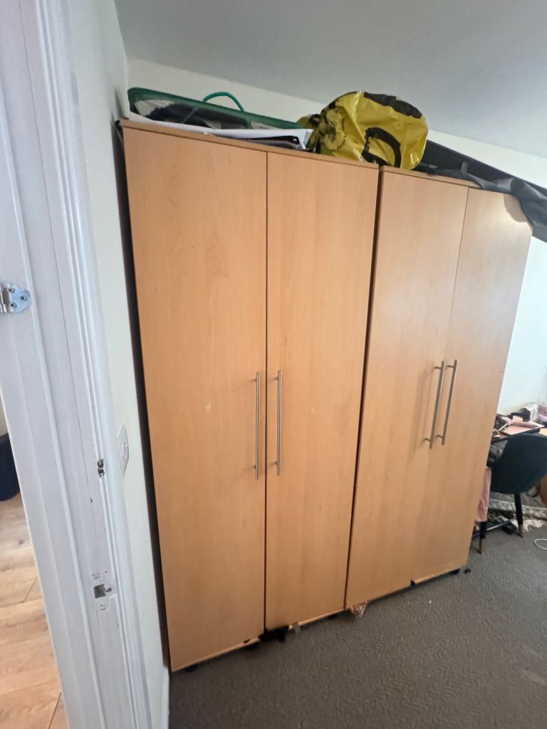 Pair of Light Wood Wardrobes – Good Condition