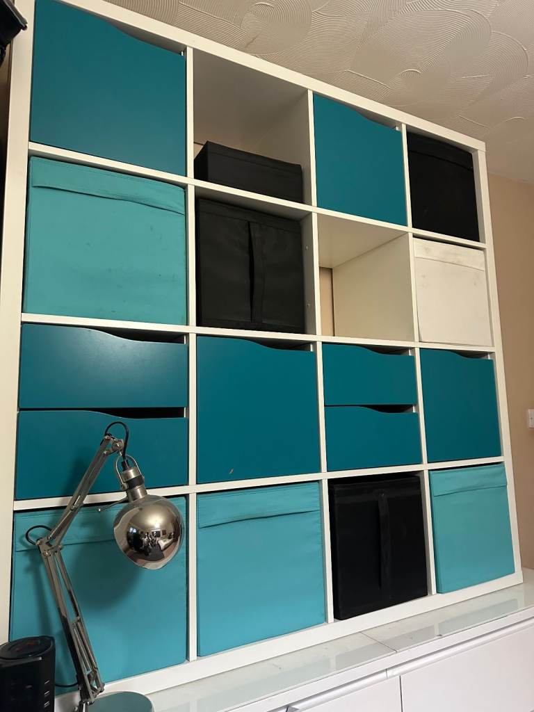 Ikea Kallax Cube Storage Unit, 147cm x 147cm, White, Comes with drawers and doors shown.