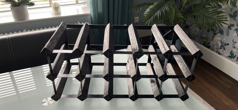 Black and metal wine rack