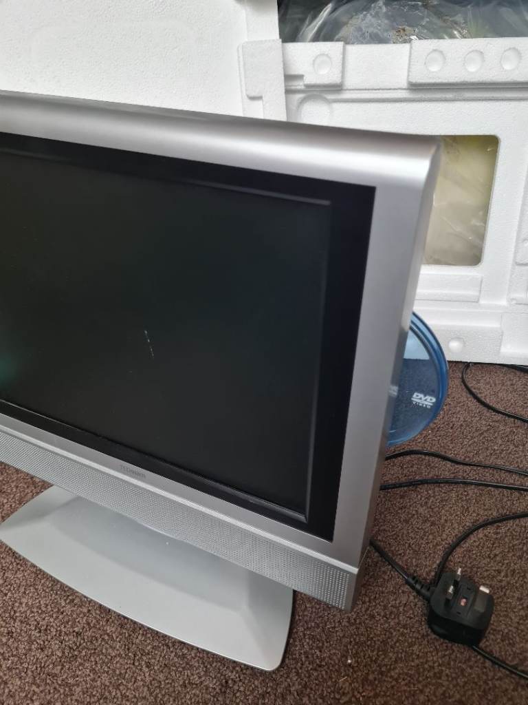 Technika tv with built in dvd player, and stand