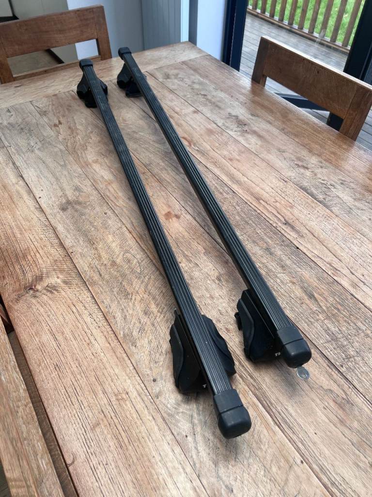 Thule Black Square Roofbars with end caps and foot pack clamps