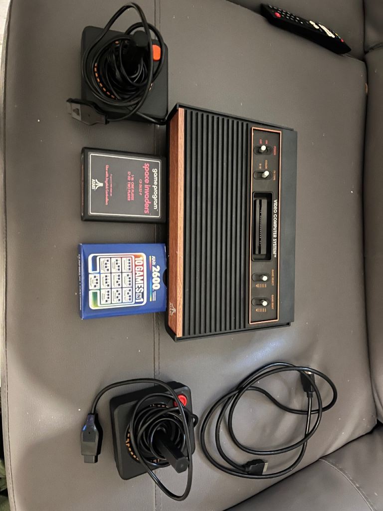Atari 2600 Console with Games and Controllers – Good Condition