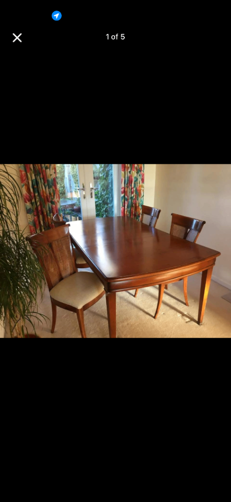 Wesley Barrell Anjou extending cherry table and four chairs 