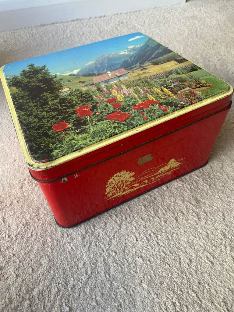 Vintage tin biscuit and chocolate boxes.