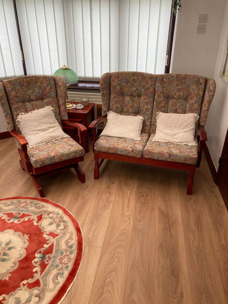 Two seater sofa and rocking chair. In excellent condition 