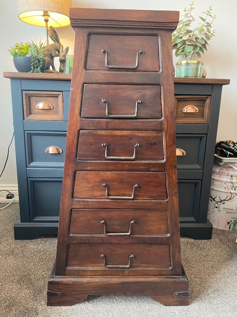 Stunning old pyramid style wooden set of drawers . 