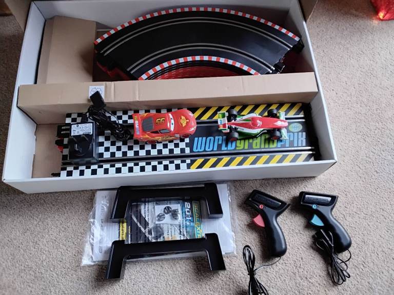 Scalextric - Disney Pixar Cars 2. 1:32 scale slot racing, World Grand Prix.