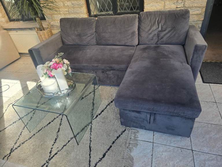 Sofabed grey velvet with Intergrated storage.  Delivery possible 