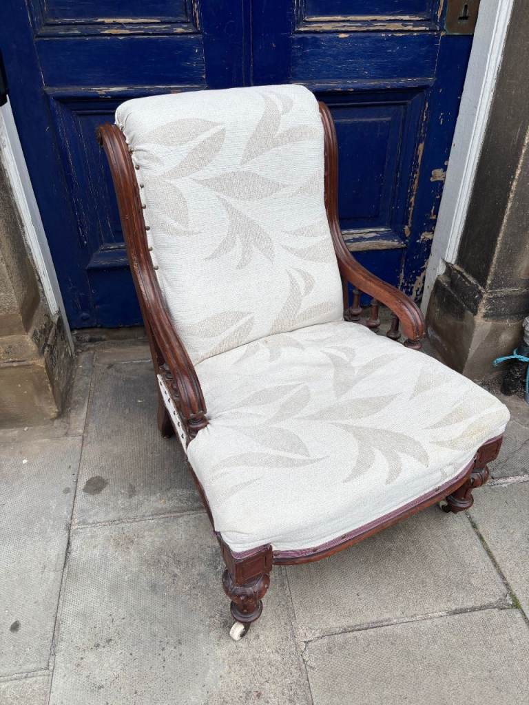 Antique low Chair , on castor wheels . Good quality and in good ...