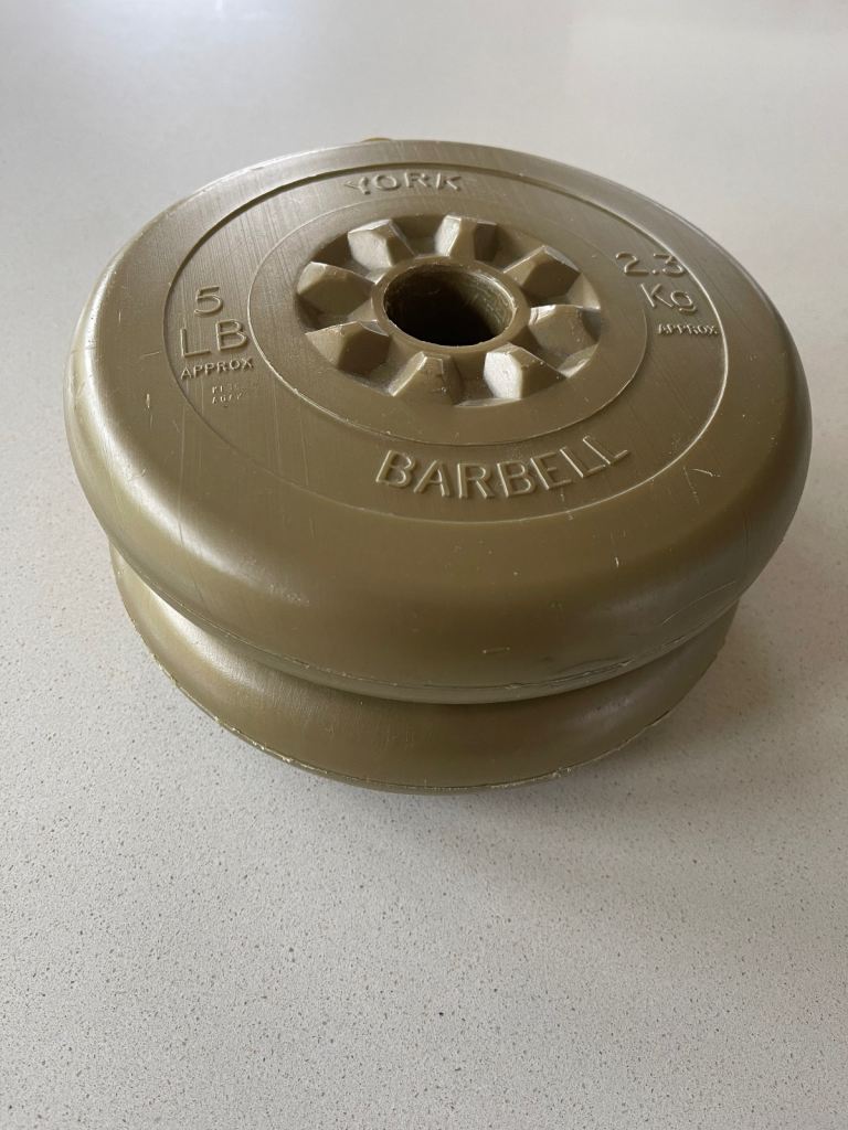 Pair of York 2.3lg plastic barbell weight plates