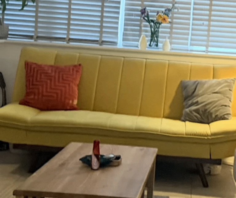 Yellow sofa bed 