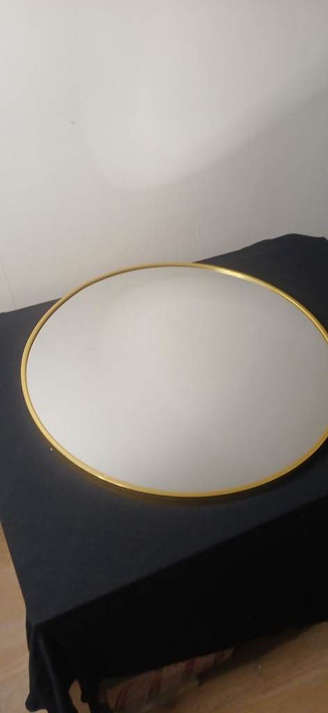 Golden circular mirror 