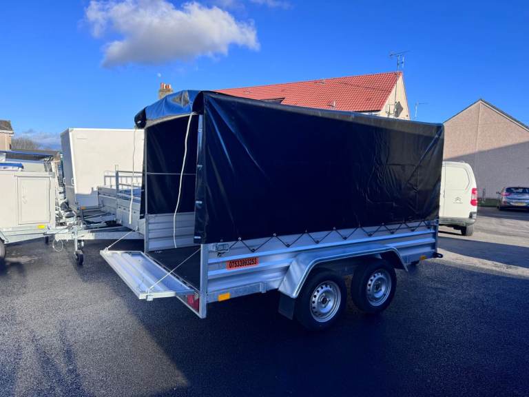 BRAND NEW 8,7ft x 4,2ft TWIN AXLE NIEWIADOW TRAILER WITH FRAME AND COVER 750KG