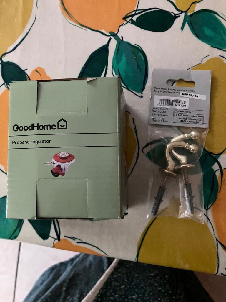 Propane regulator and gold tie back hooks 