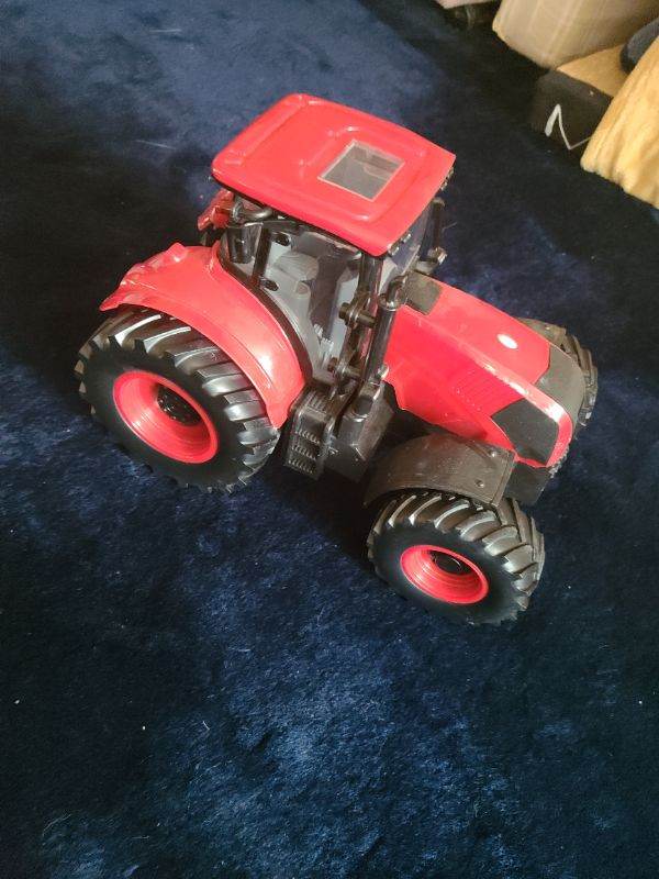 Large Red light and sound farm tractor