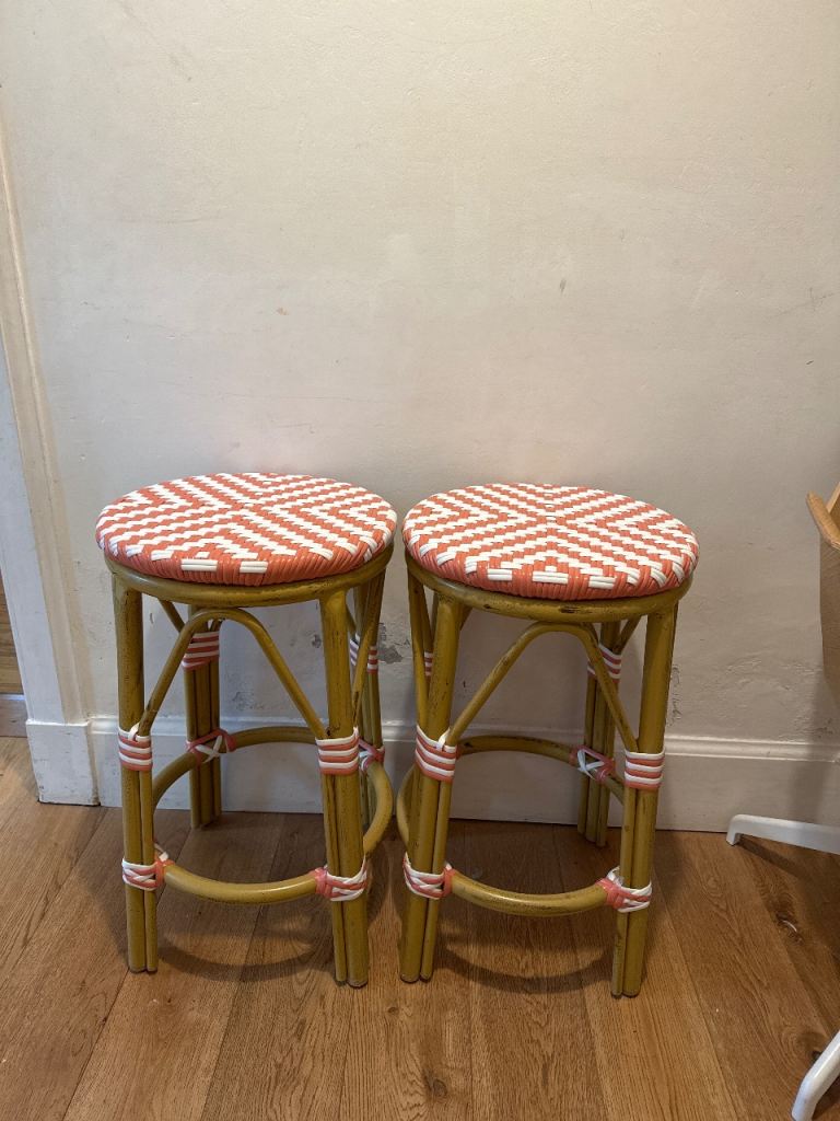 Pink and white Rattan style bar stools
