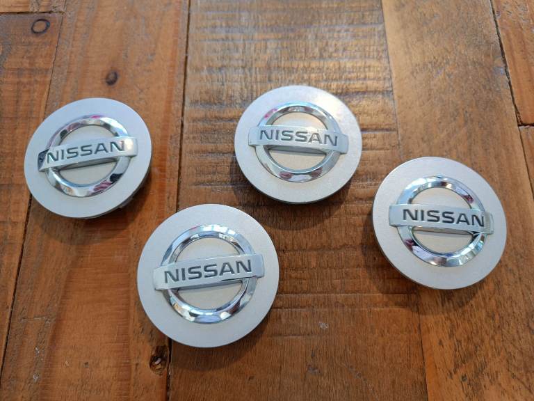 Nissan wheel centre caps - 58mm dia vgc