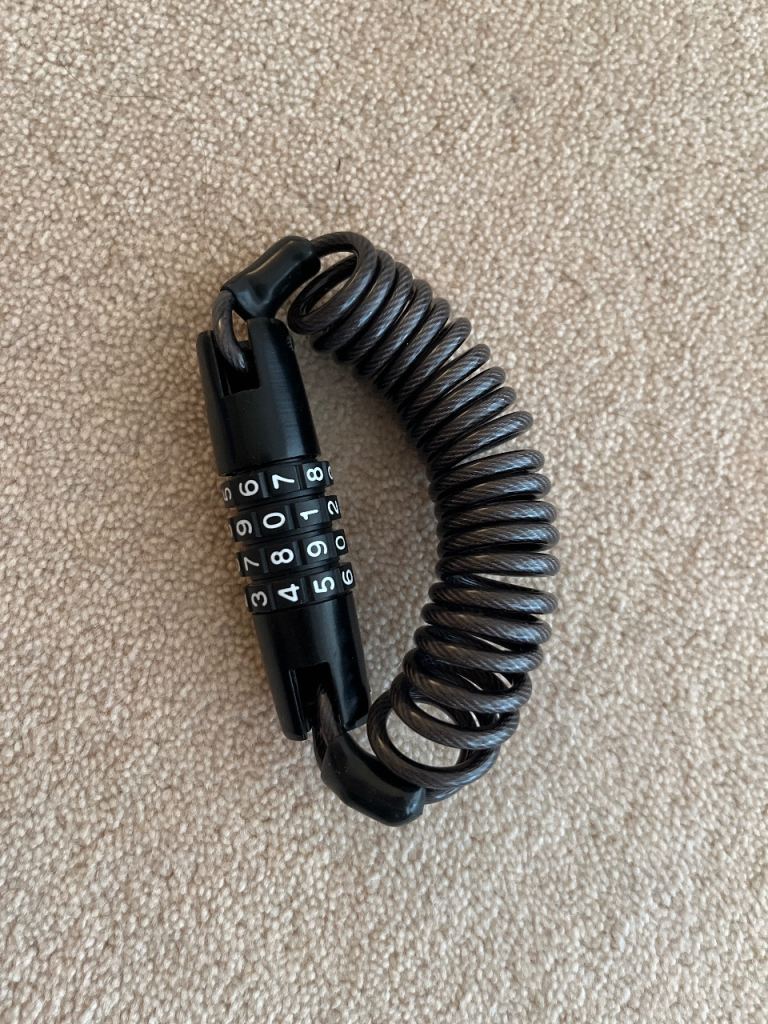 Portable coiled cable lock