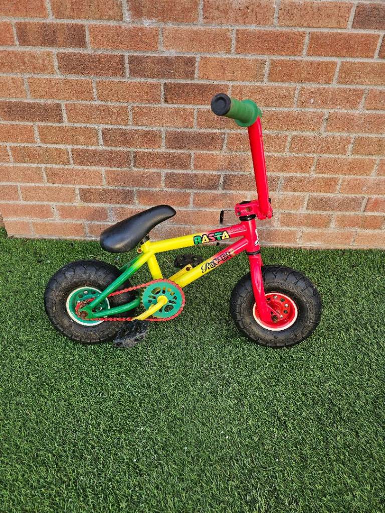 Rocker Irok+ Rasta Mini BMX Bike.