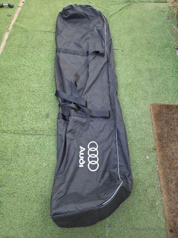 Audi-branded storage bag for a car roof box or roof rack system.
