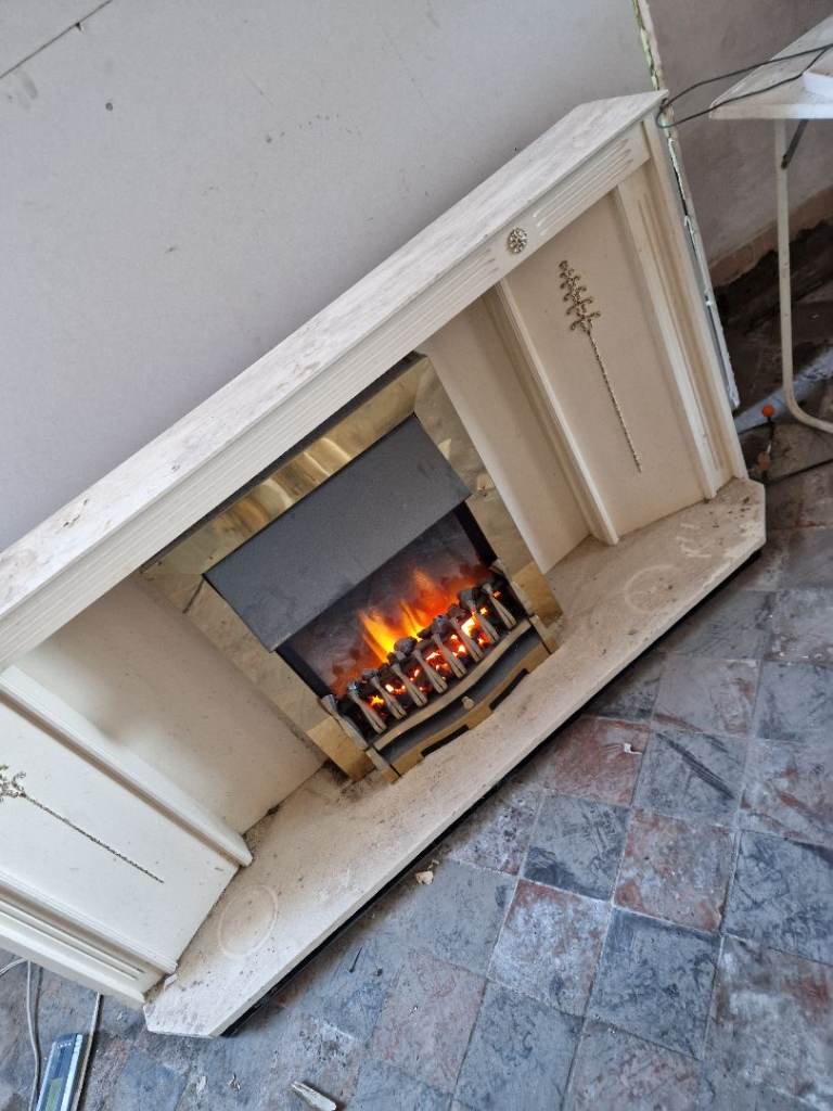Fireplace fire surround with electric fire place upcycle 