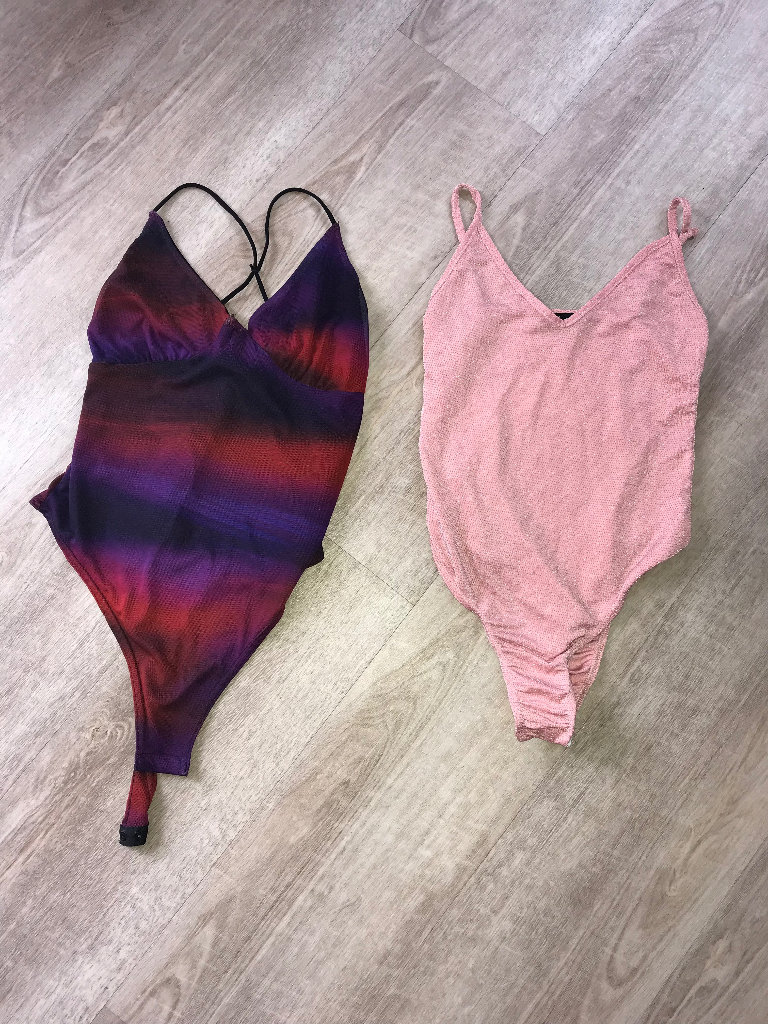 2 x size 10 body suits Pretty Little Thing, 1 rainbow 1 pink glitter 