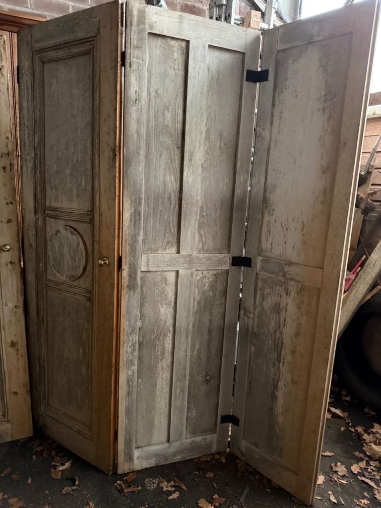 An Original Pair Of huge Early Victorian Pine Door triple Door Shutters.