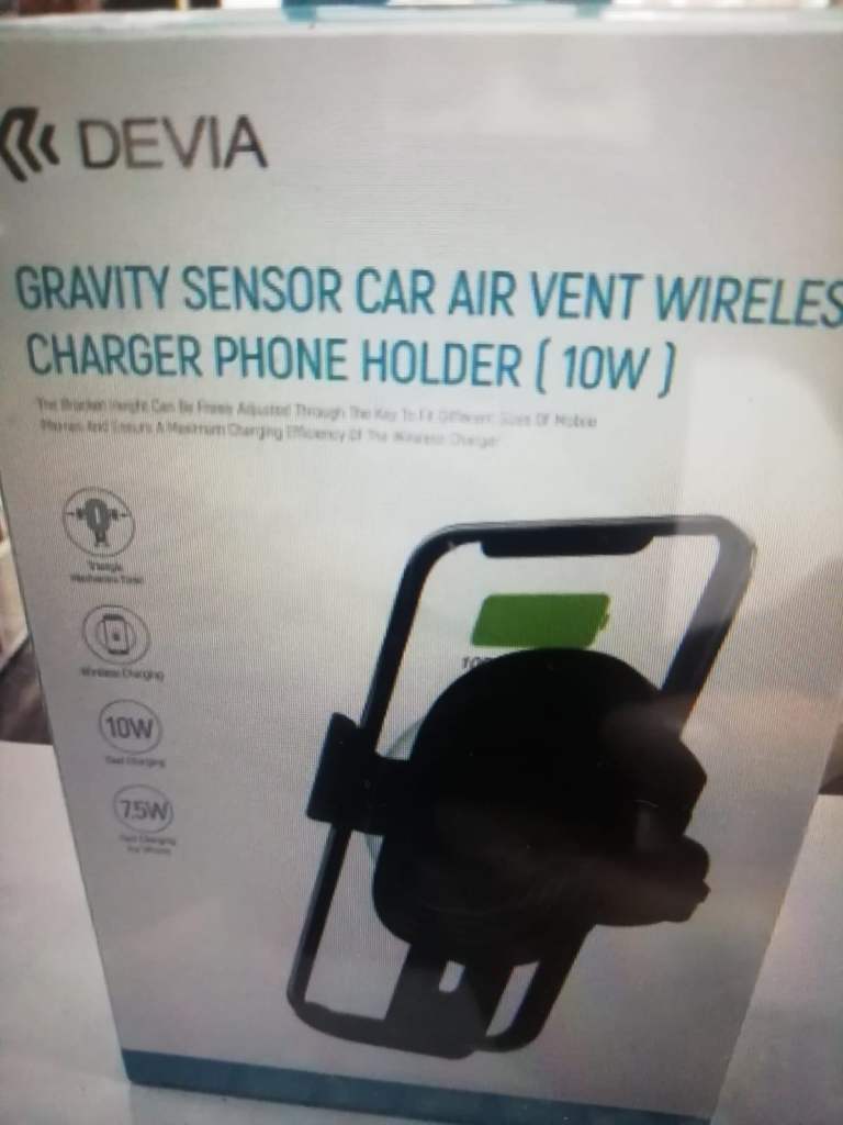 New in box Gravity sensor charger car phone holder air vent mount cradle