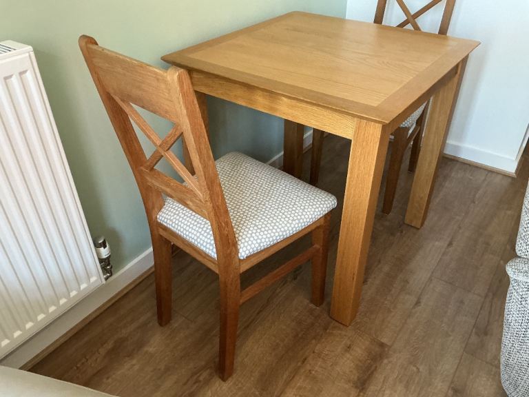 Oak table and two chairs