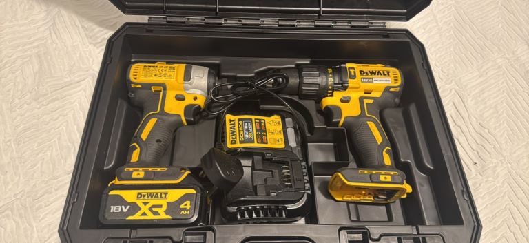 Brand new dewalt drill and impact set with 1  4ah battery and charger 