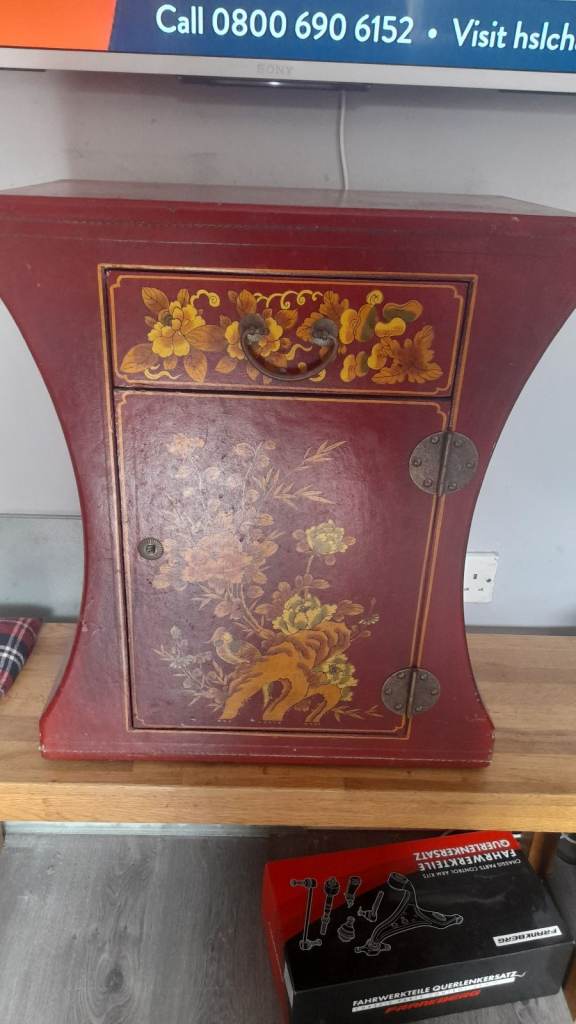 Oriental red lacquered cabinet