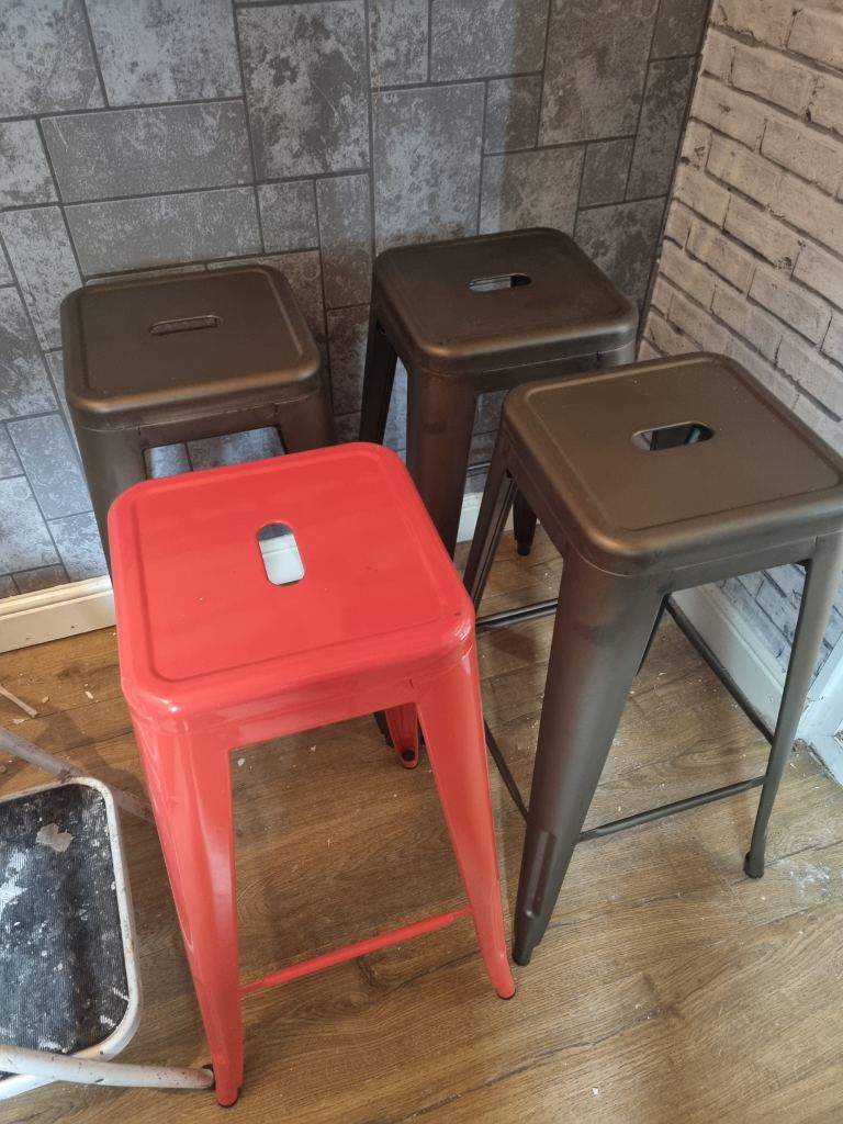 4 bar stools 1 orange 3 brown 