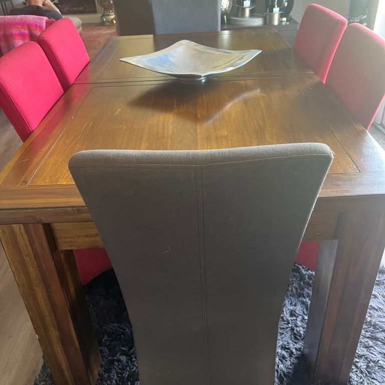 Solid Walnut Dining Table with charcoal grey rug