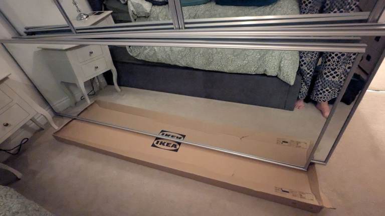 Mirrored wardrobe sliding doors and track