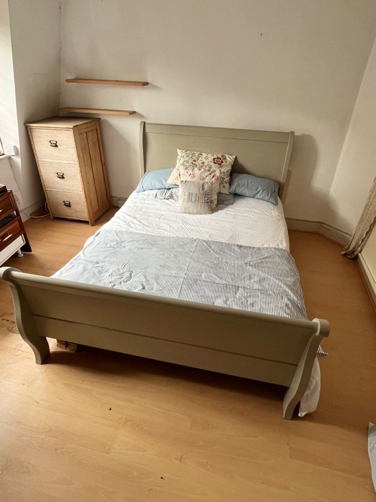 Wooden sleigh style double bed frame